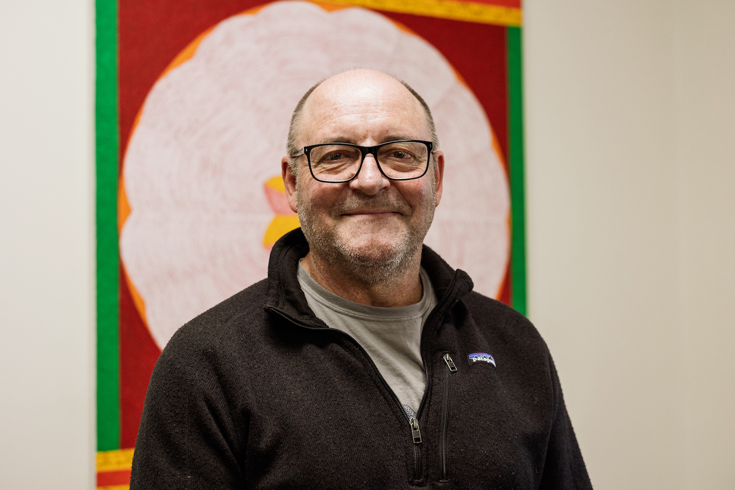 Professor Simon Haberle, Director of the School of Culture, History and Language (CHL) A profile picture of Simon Harbele standing in front of an artwork