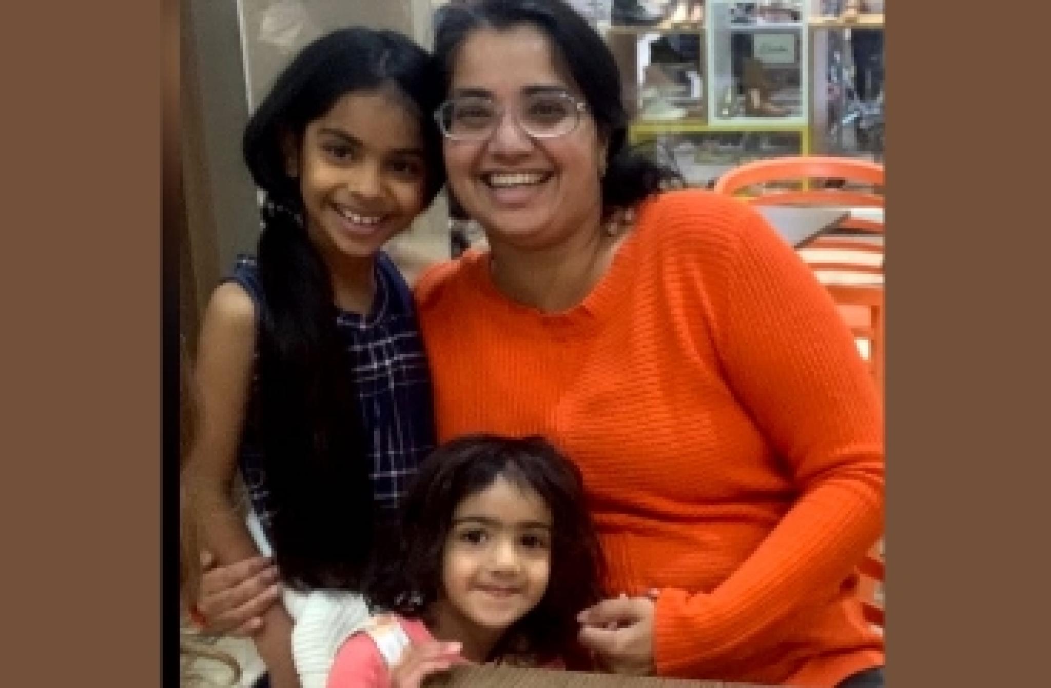 Shvetal with her two daughters