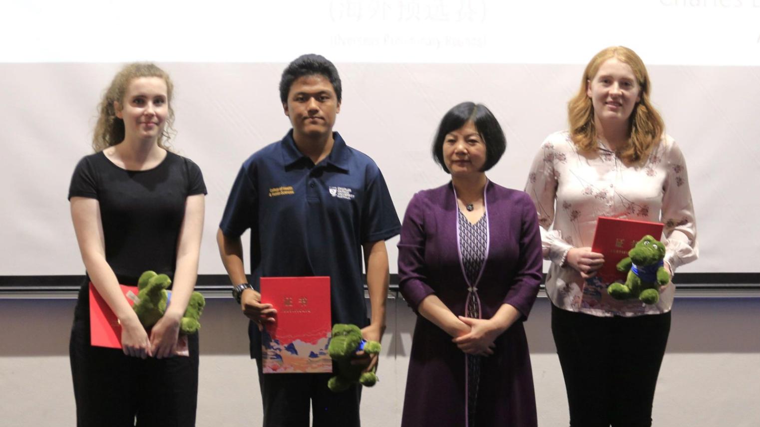 Cosette Craig (extreme right), accepting her award of first prize (Photo Supplied)